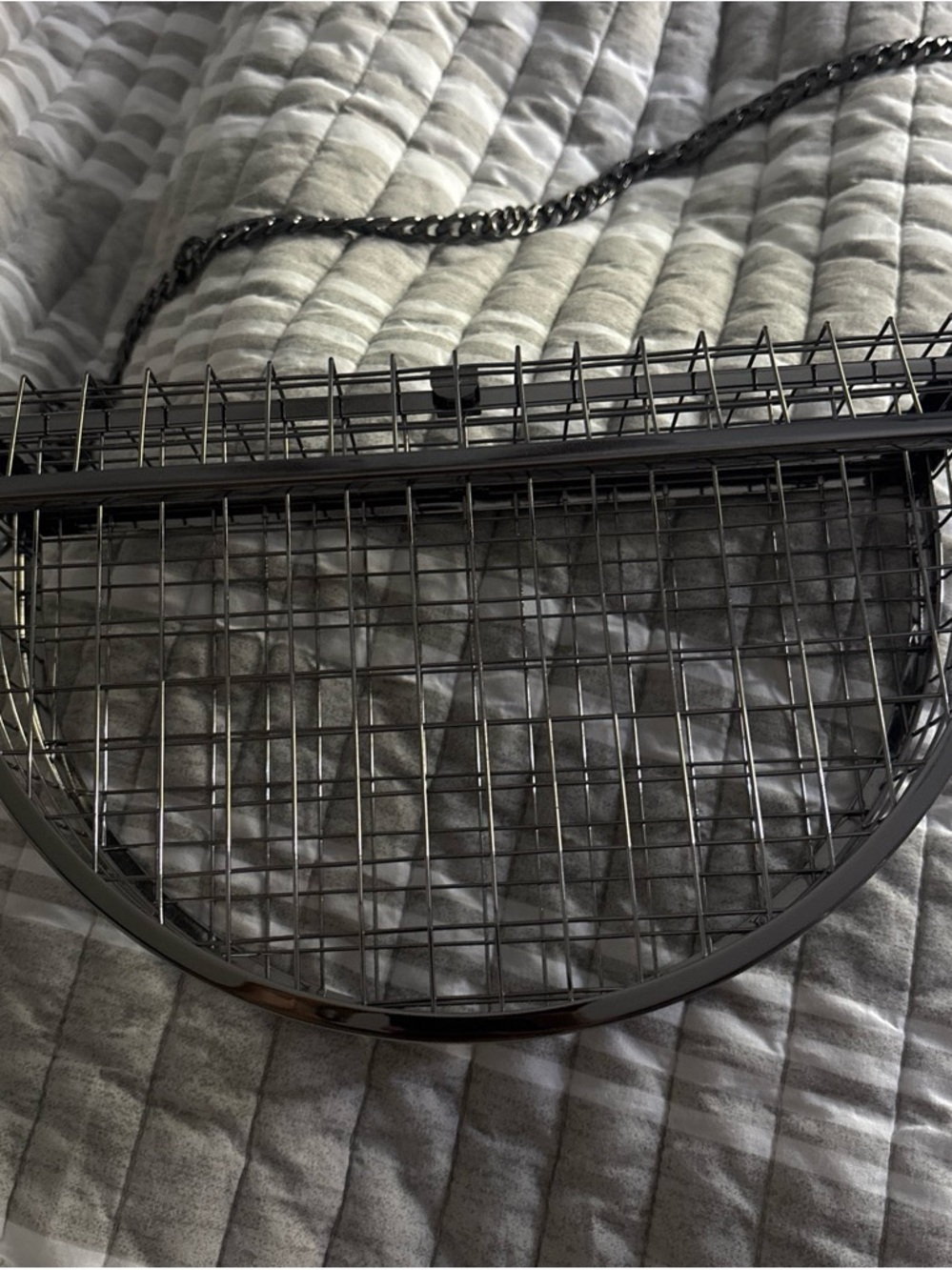 Metal Grid Half-Moon Crossbody Bag in Gunmetal